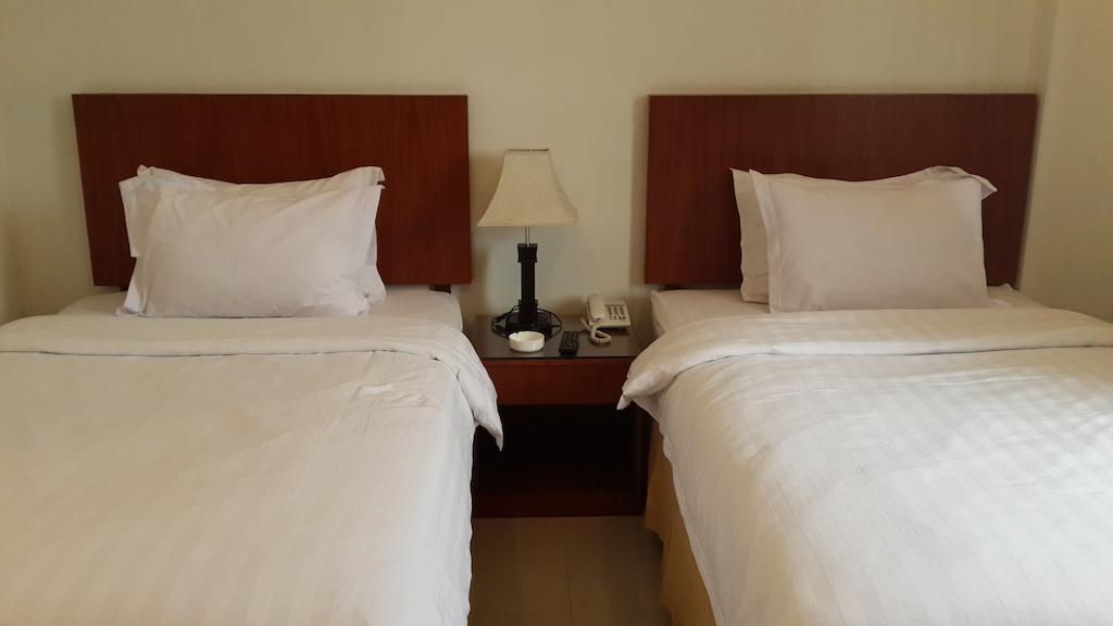 Kailani Inn Medan Chambre photo