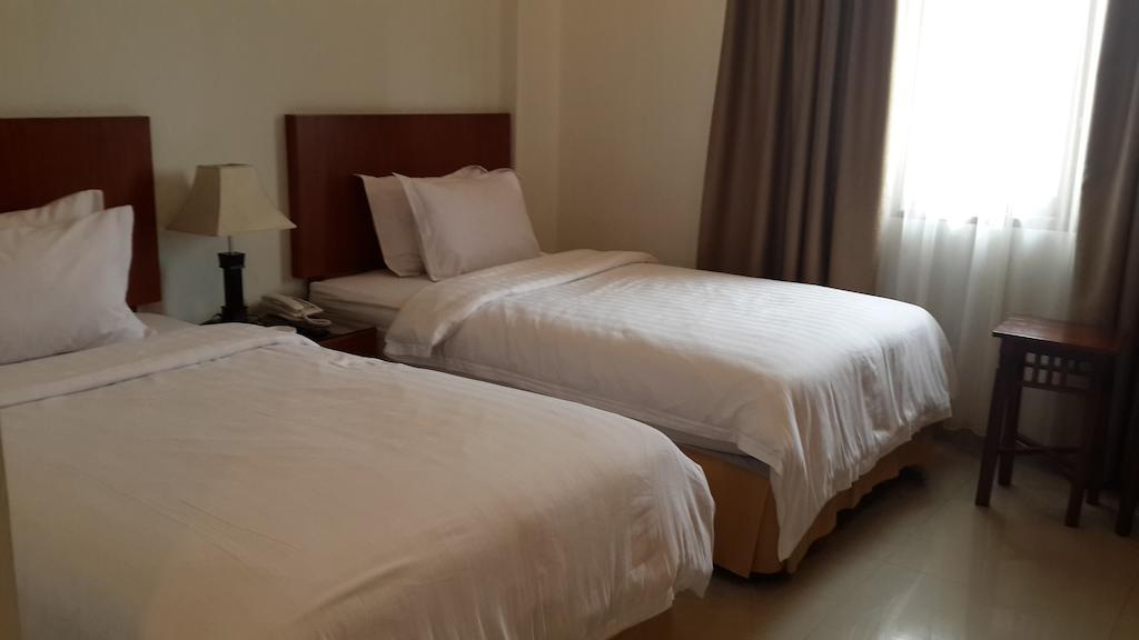 Kailani Inn Medan Chambre photo