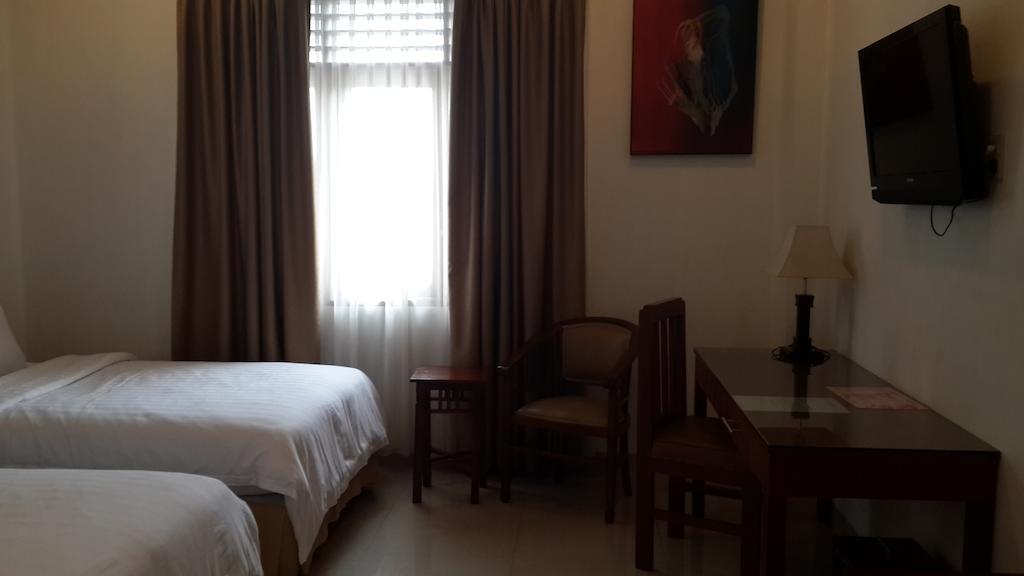 Kailani Inn Medan Chambre photo